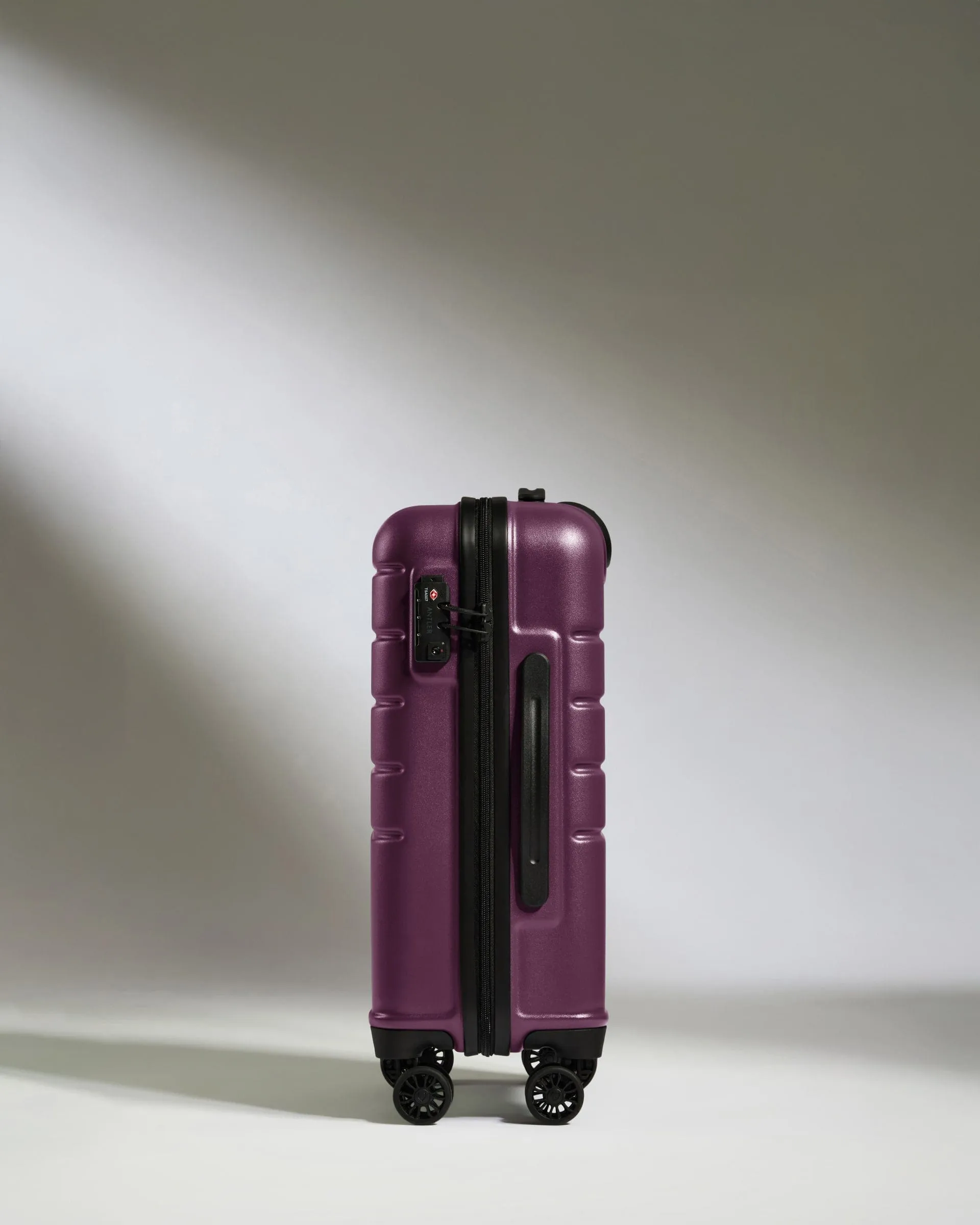 Cabin Suitcase in Dark Heather Purple - Logo