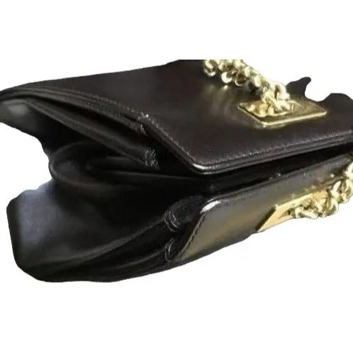 Gucci, unique, brown leather, large satchel style  shoulder bag with a snap hinged top, two longer gold chain & leather shoulder straps