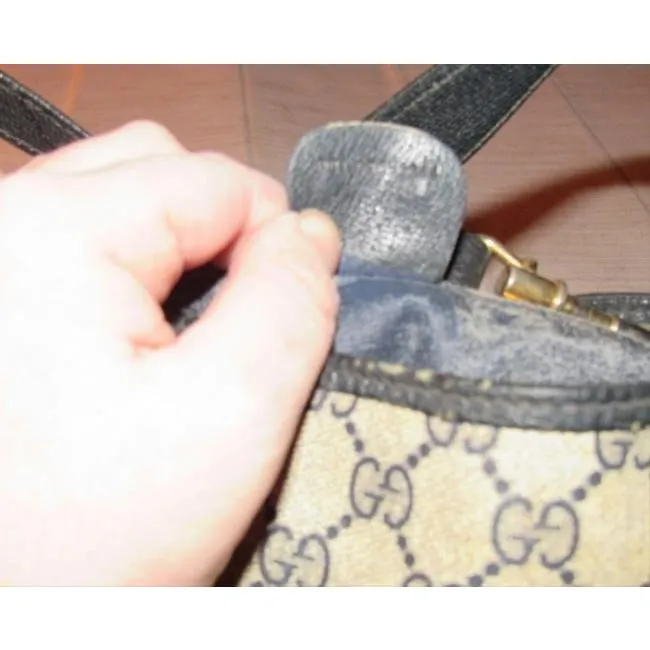 Mod, Gucci, 1961 Jackie- O style, dark blue Guccissima print coated canvas and navy leather, shoulder bag with gold piston closure and strap extender