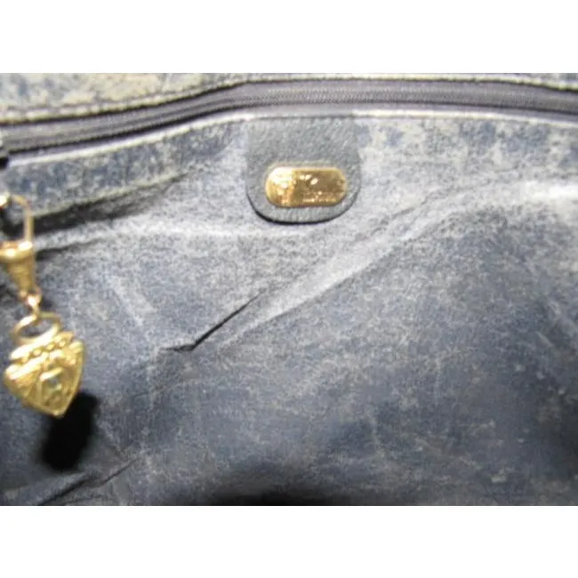 Mod, Gucci, 1961 Jackie- O style, dark blue Guccissima print coated canvas and navy leather, shoulder bag with gold piston closure and strap extender